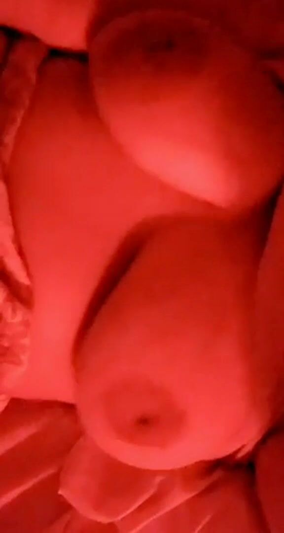 Bouncing titties while laying back