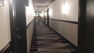 Naked in the hotel hallway