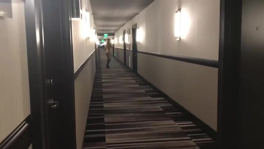 Naked in the hotel hallway