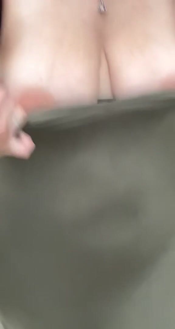 Flashing my big areolas on the street.
