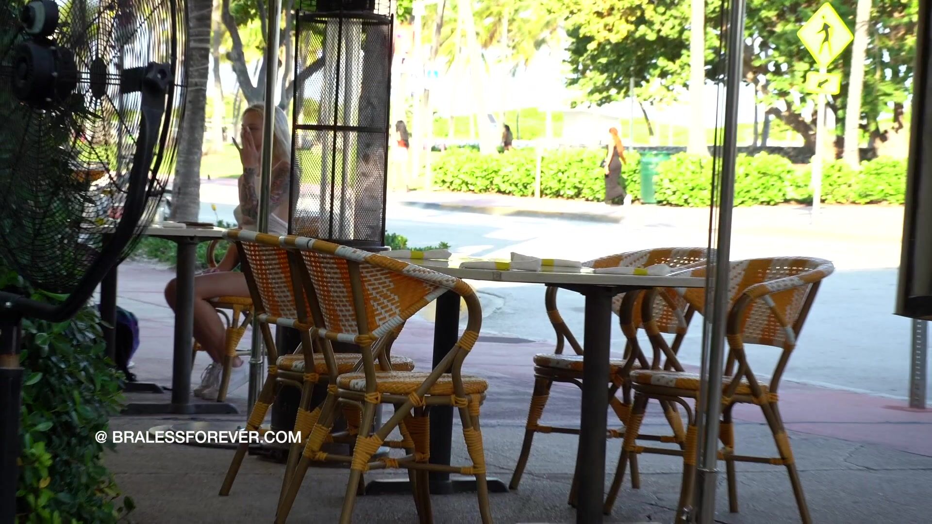 Is she wearing a sheer top in public? Let me zoom in for a closer look. Yup, definitely.